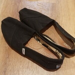 TOMS Black Canvas Slip-Ons
